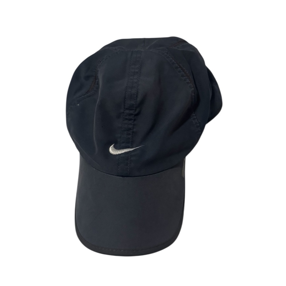 Nike one size fits most black hat with white accents in great condition!